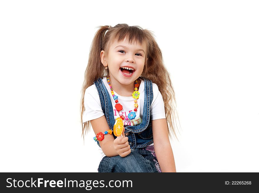 Laughing attractive girl with orange candy on stick isolated on white. Laughing attractive girl with orange candy on stick isolated on white