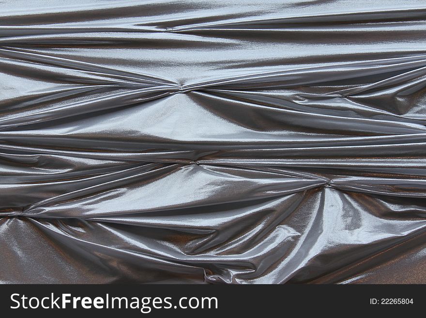 Background textured of textiles silver material. Background textured of textiles silver material