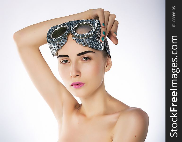 Wellness- pretty young woman swimmer in sport goggles or mask - studio shot, series of photos. Wellness- pretty young woman swimmer in sport goggles or mask - studio shot, series of photos