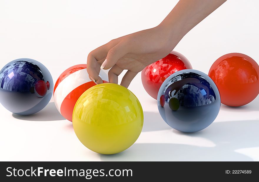 The image of a hand and colour spheres. The image of a hand and colour spheres