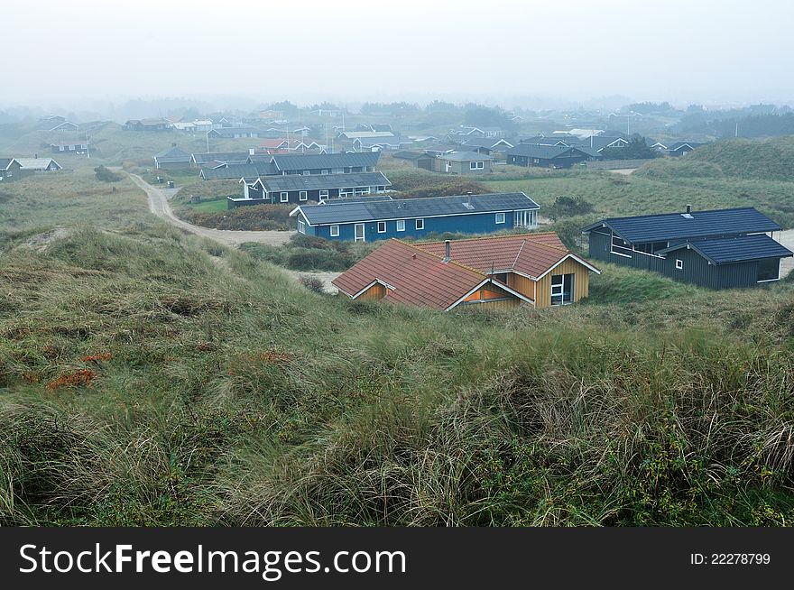 Fog over the sand dunes in Blokhus Denmark near the baech