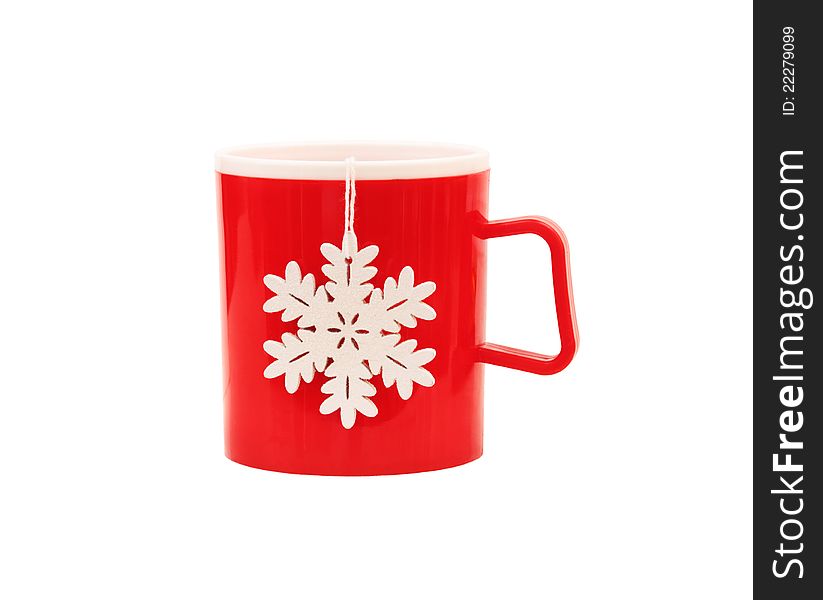 Red plastic cup and snowflake isolated on white. Red plastic cup and snowflake isolated on white