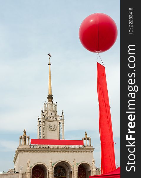 Celebration balloon and red flag