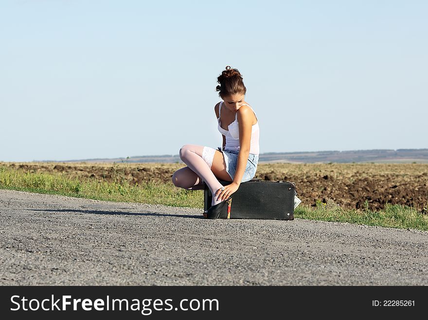 The lonely girl on road