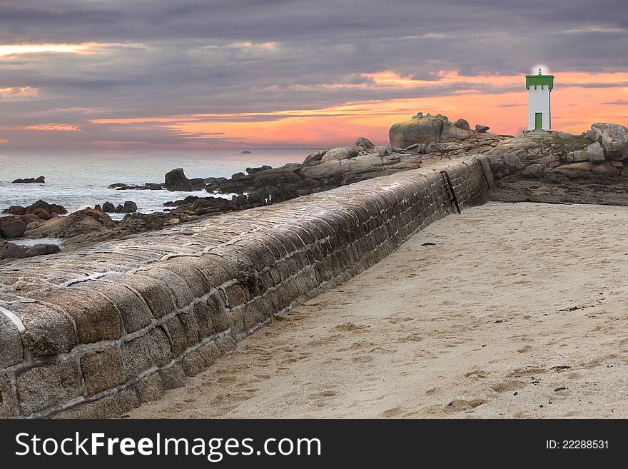 Colorful sunset with lighthouse, near the Atlantic, France. Colorful sunset with lighthouse, near the Atlantic, France