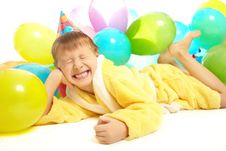 Little Boy In Dressing Gown Celebrates Birthday Royalty Free Stock Photo