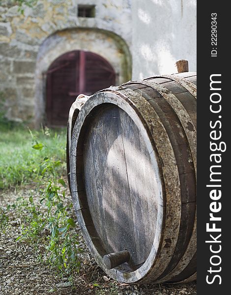 Old, abandoned barrels near  a vine cellar.