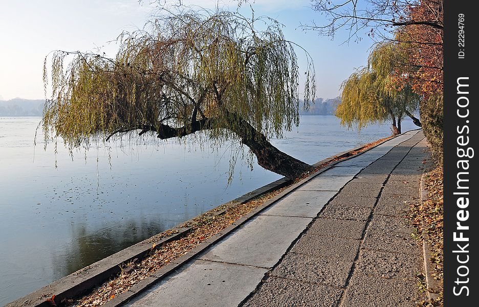 Boat cargo on still river in evening autumn time. Boat cargo on still river in evening autumn time