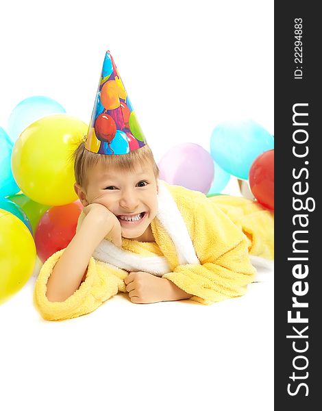 Little Boy In Dressing Gown Celebrates Birthday