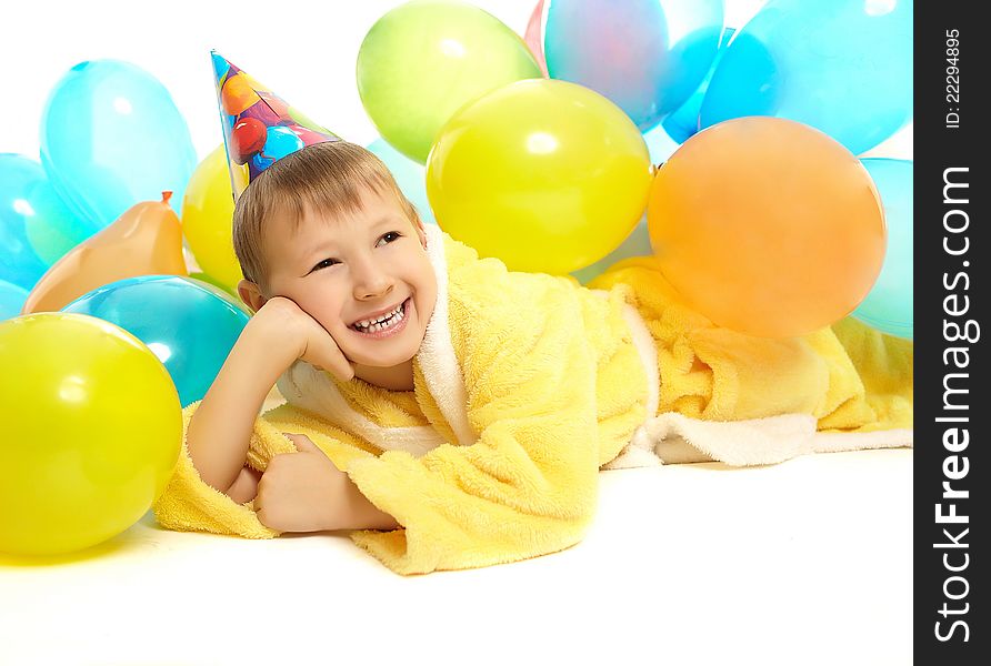 Little Boy In Dressing Gown Celebrates Birthday