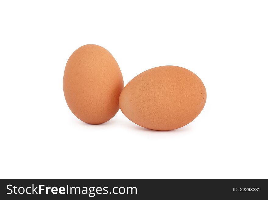Two raw eggs on white background. Isolated with clipping path