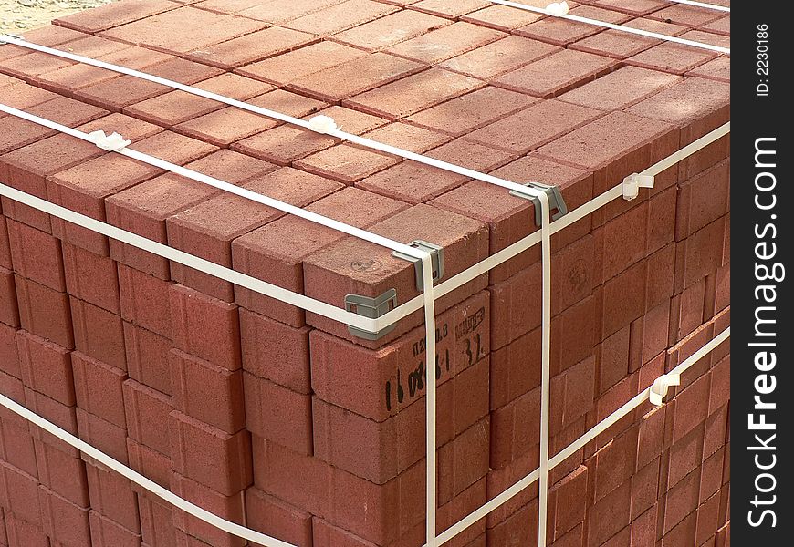 Cube of building stone at the street of our city