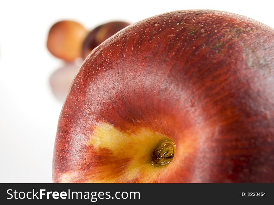 Fresh colored peaches close up