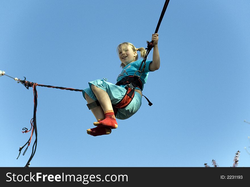 Jumping Girl (trampoline at the funfair)