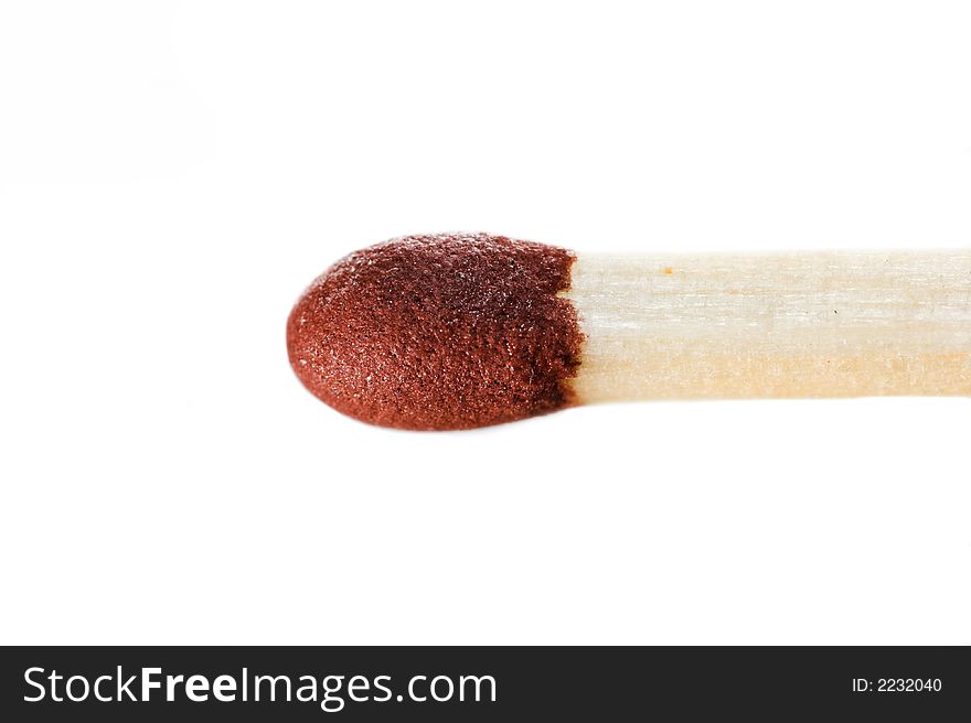 A macro photo of a single matchstick