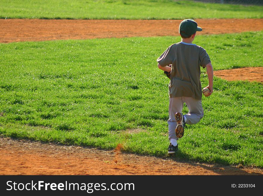 Late afternoon little league practice. Late afternoon little league practice