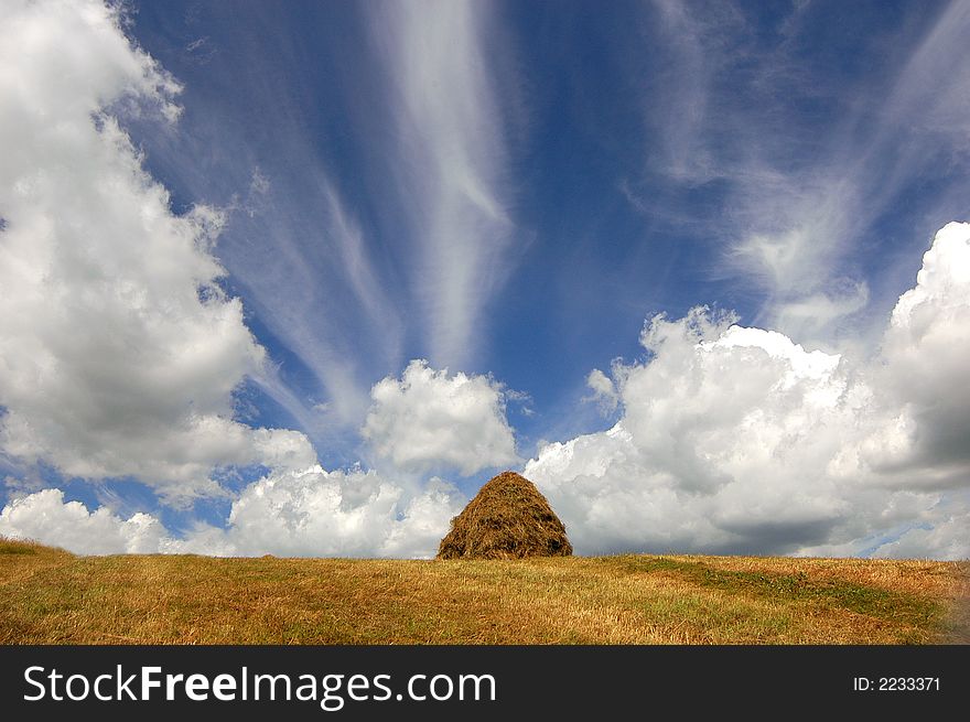 Rural landscape with cumulus clouds