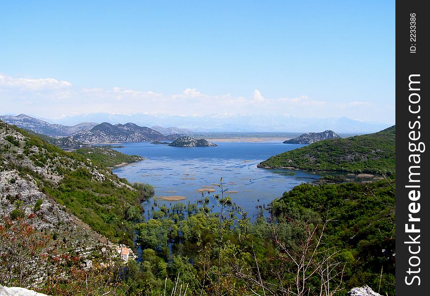 Mediterranean landscape with blue sky and lake. Mediterranean landscape with blue sky and lake.