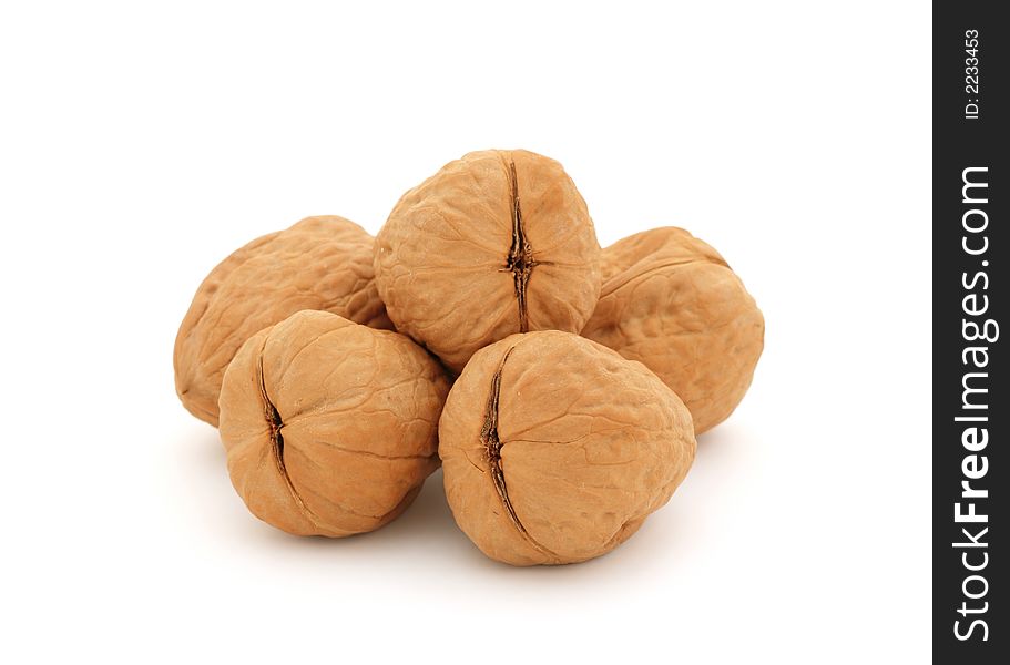 Five walnuts over white background (clipping path included). Five walnuts over white background (clipping path included)