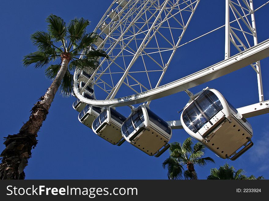 Ferris wheel on a sunny morning at the resort. Ferris wheel on a sunny morning at the resort