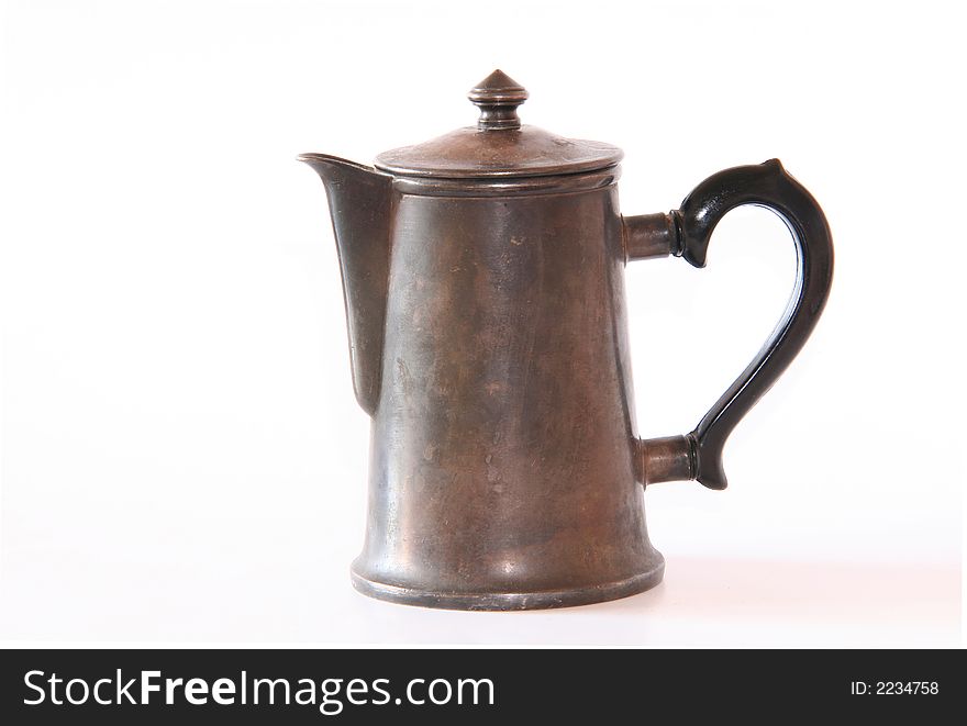 Old silver coffeepot on a white background