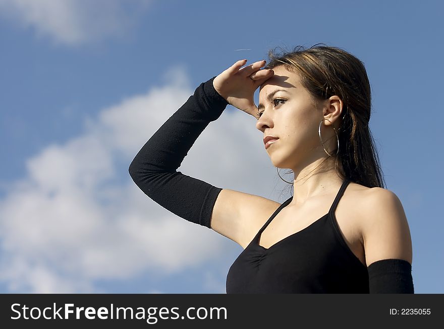 Attractive young businesswoman facing the future