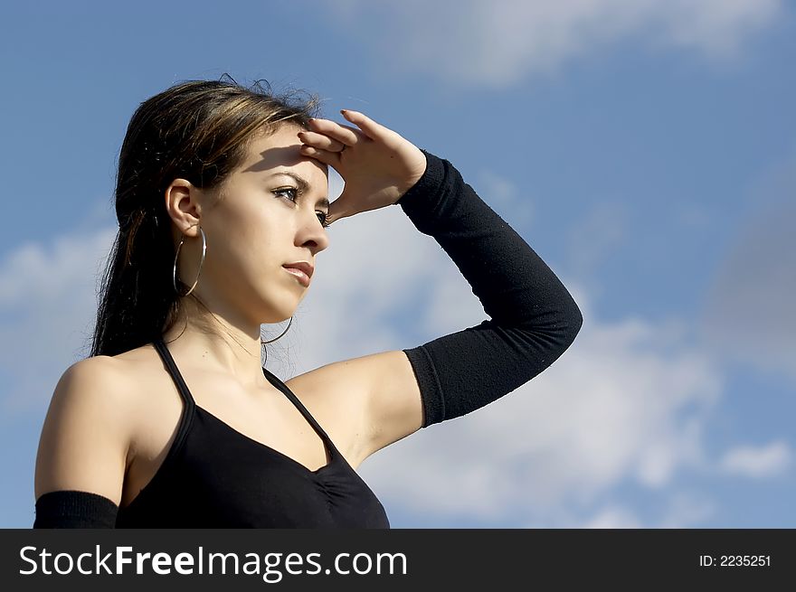 Attractive young businesswoman facing the future