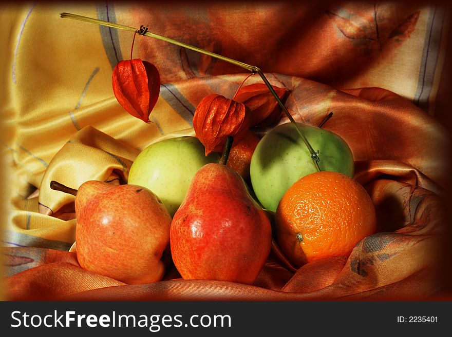 Fruit composition on a colorful material. Fruit composition on a colorful material