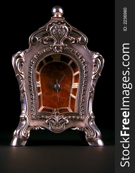 Antique silver clock