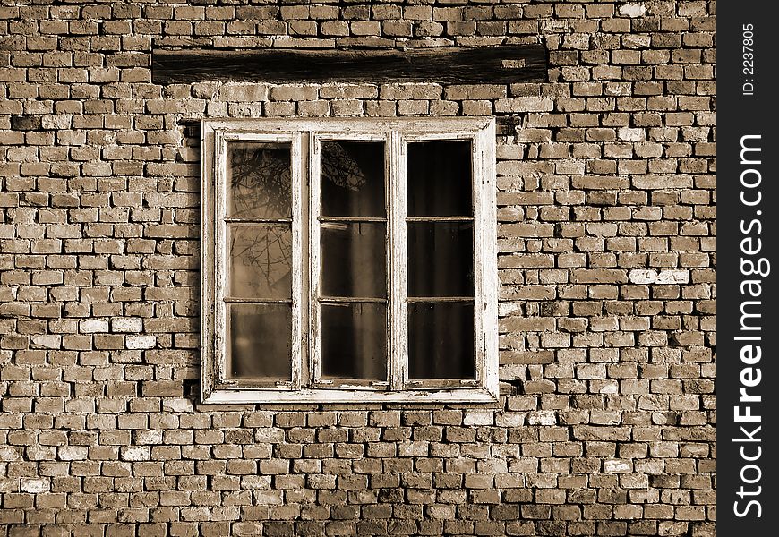 A detail of an old brick house. A detail of an old brick house