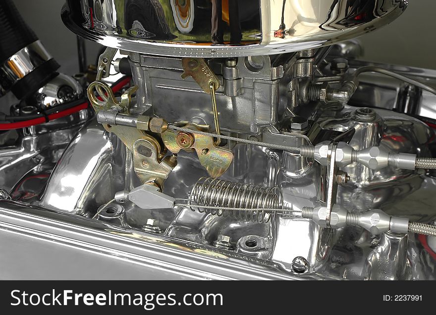 Complex carburetor and engine detail on hot rod
