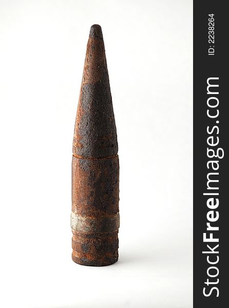 Old rusty shell. War tool. Weapon. Echo of war.