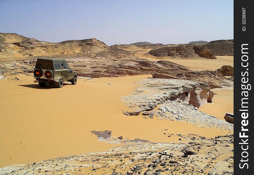 Great, quiet desert and car