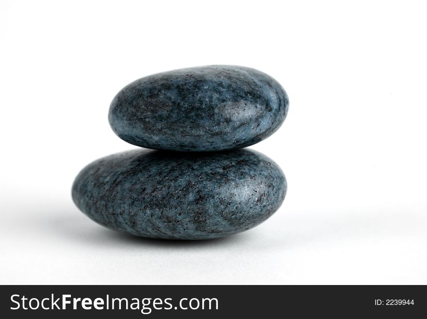 Some stones and a white background