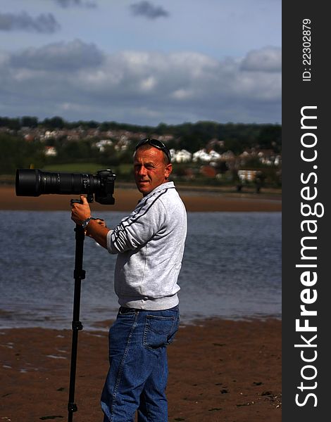 Professional photographer photographing the River Exe. Professional photographer photographing the River Exe.