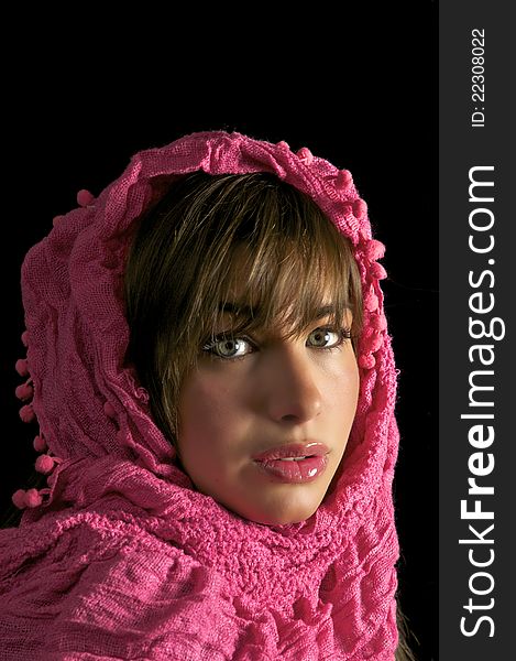 Pretty Young Girl in Pink Head Wrap on Black Backround. Pretty Young Girl in Pink Head Wrap on Black Backround.