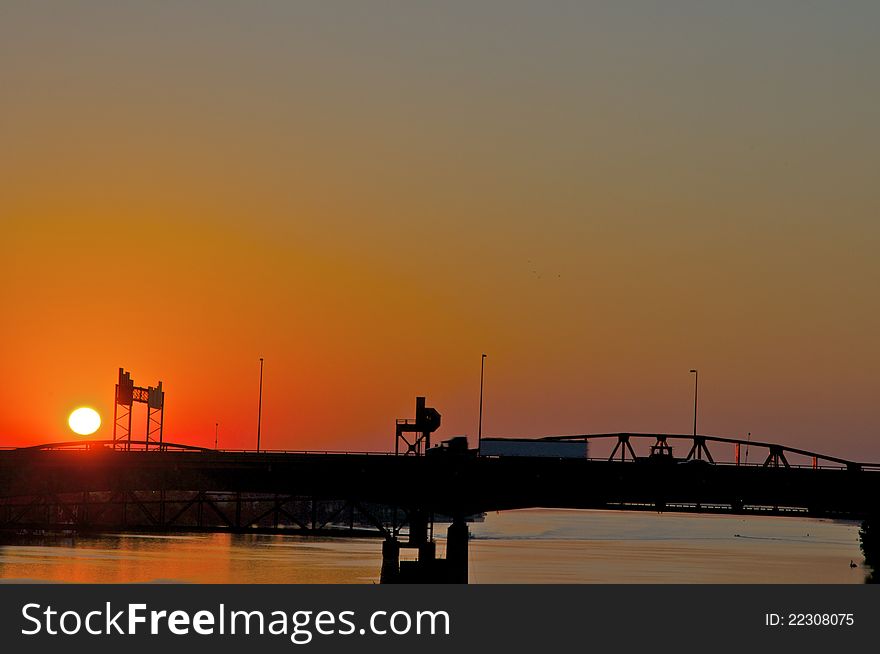 Sunrise over interstate highway bridge - Commerce. Sunrise over interstate highway bridge - Commerce