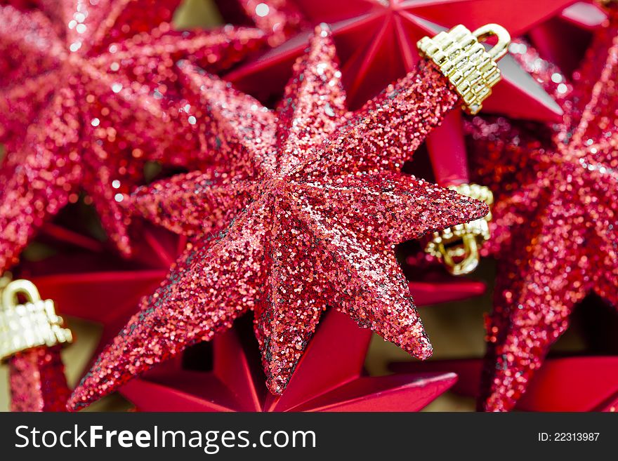 Close Up Photograph Of Shinny Red Christmas Stars