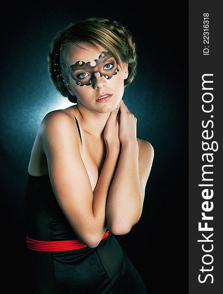 Masked girl in carnival mask