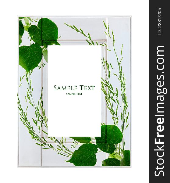 White frame with green leaves isolated on white background.