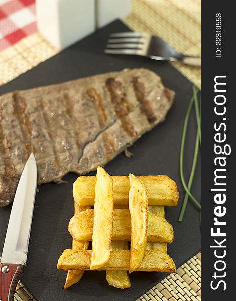 Beef steak grilled with chips