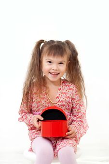 Little Girl Opens Her Present Stock Photography