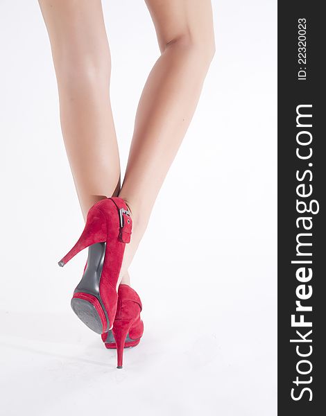 Walking with heeled red shoes by 15 cm