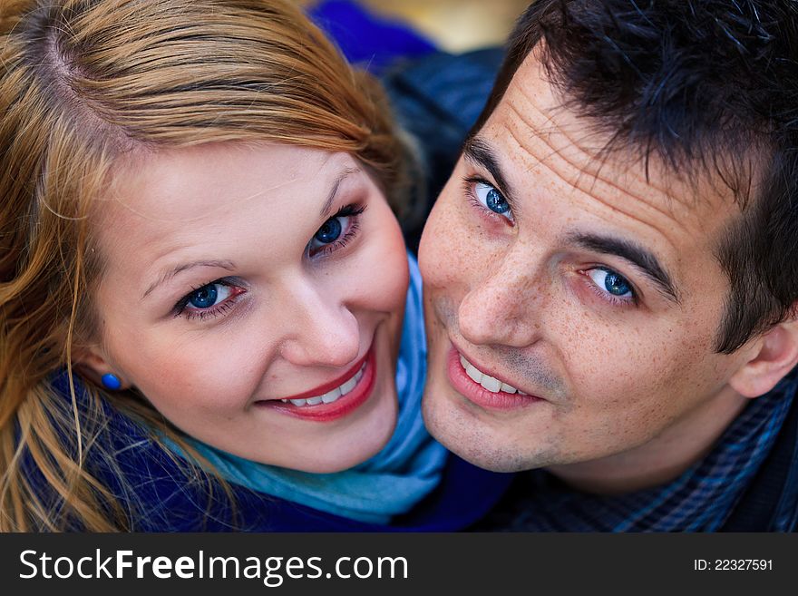 Happy Couple Standing Together in the Park During Autumn. Happy Couple Standing Together in the Park During Autumn