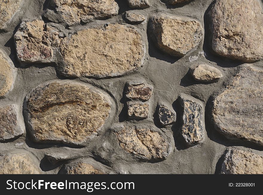 Masonry made from big irregular shaped boulders in old historical district of Minsk city. Masonry made from big irregular shaped boulders in old historical district of Minsk city