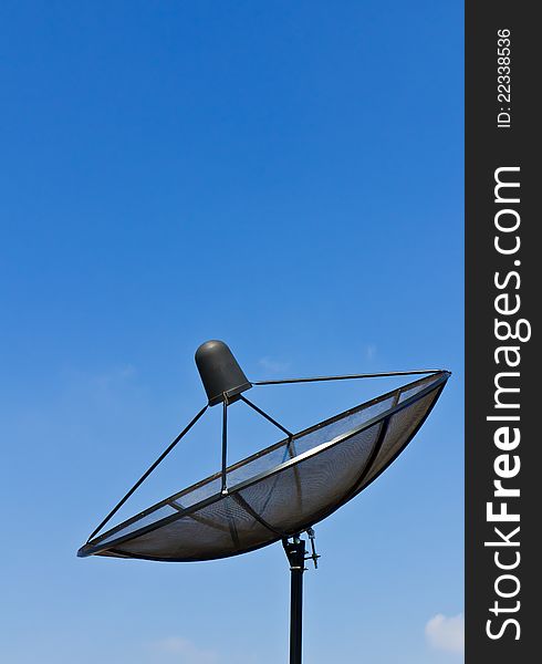 Satellite dish antennas under blue sky