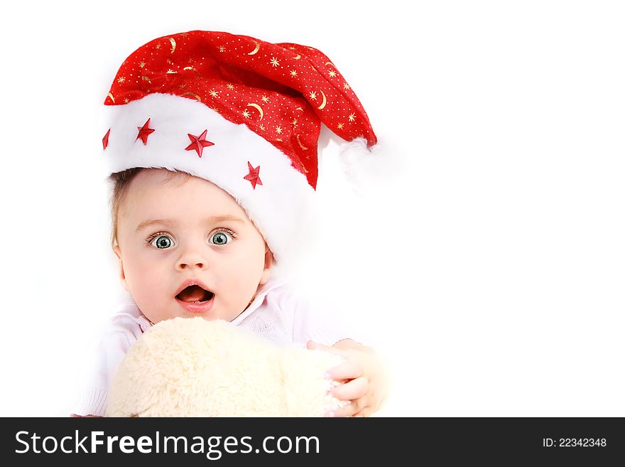 Babe in santa hat isolated on white background. Babe in santa hat isolated on white background