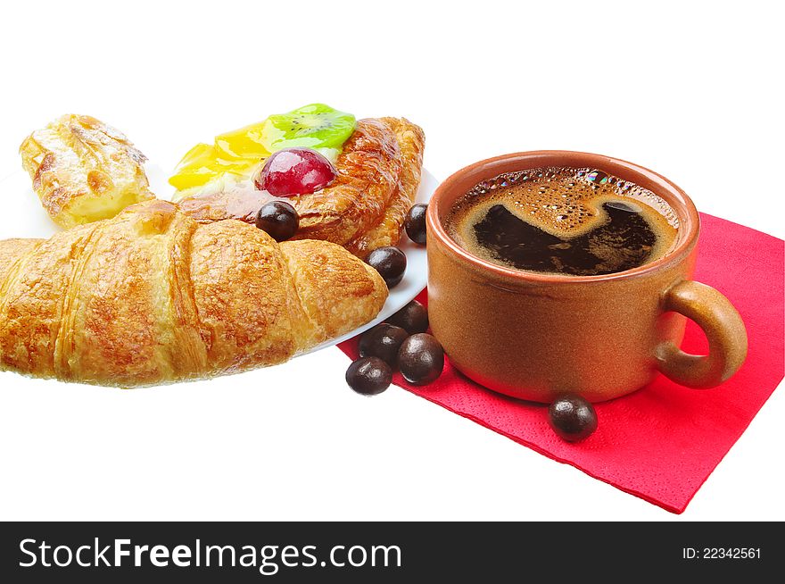 Cup of coffee and different sweet baking isolated on a white background. Cup of coffee and different sweet baking isolated on a white background