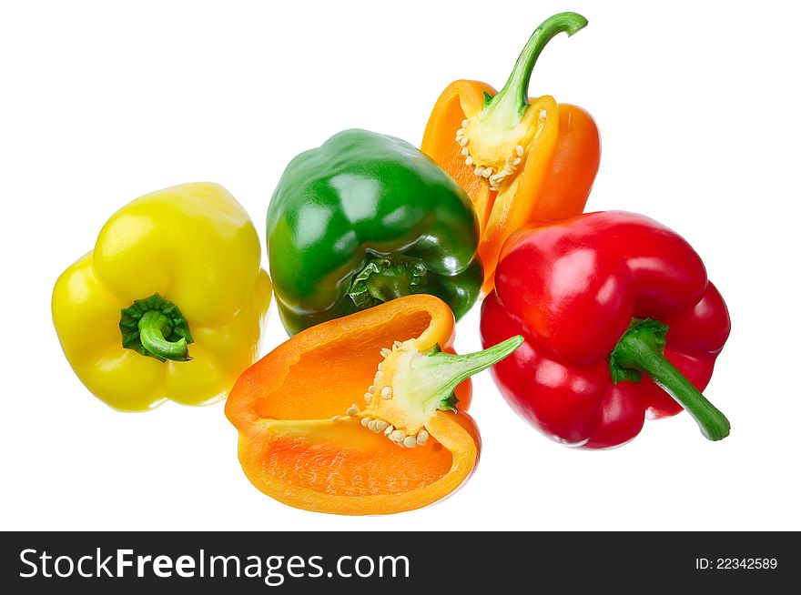 Multi-colored peppers isolated on a white background. Multi-colored peppers isolated on a white background