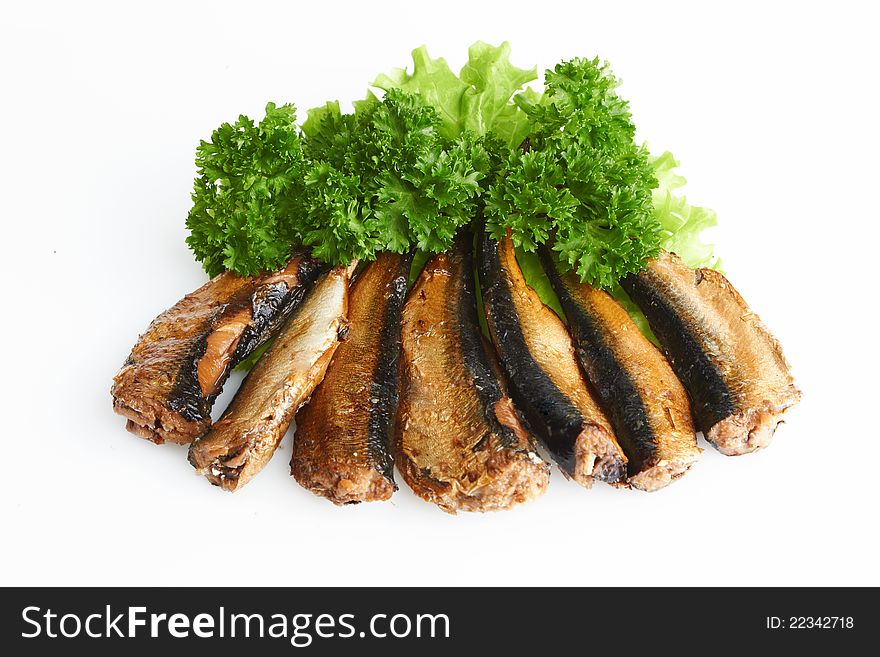 Smoked sprats in oil on white background